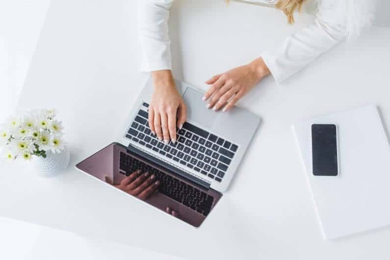 woman working on improving her website's EAT signals